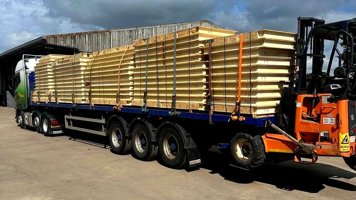 Full lorry load of Premier Sips SIP panels being loaded by forklift for UK-wide delivery